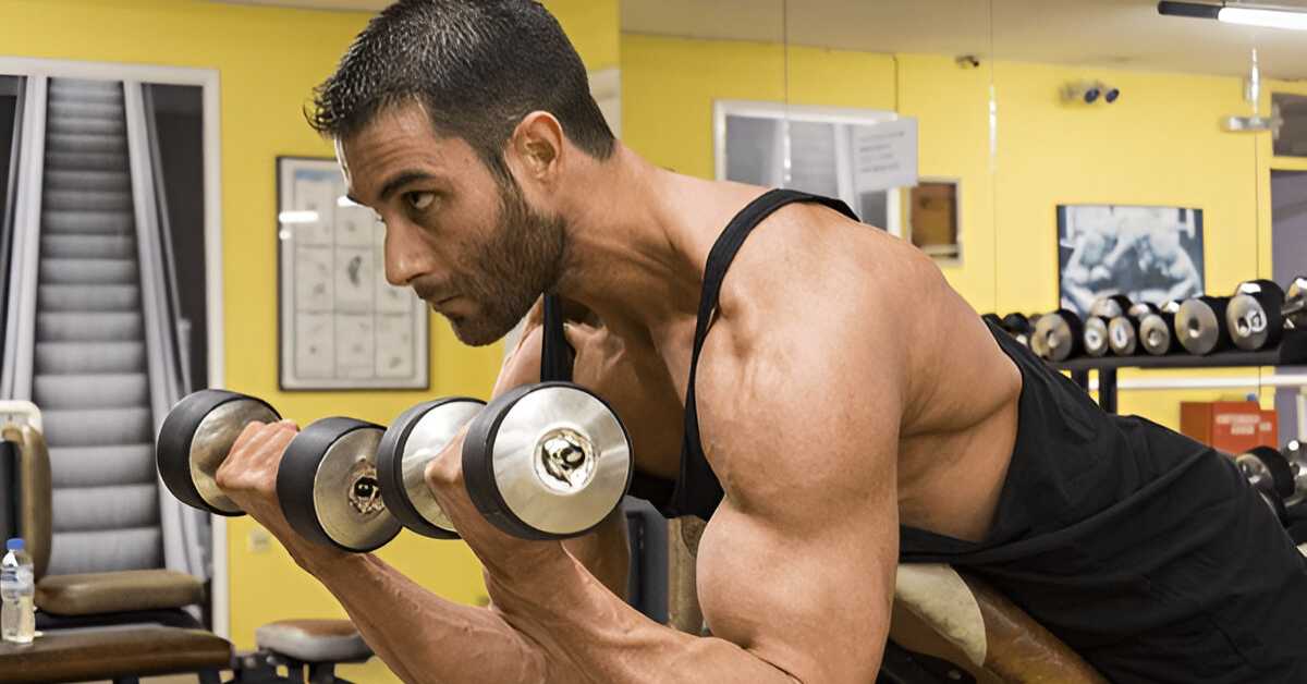 A man performing Decline Bicep Curls.