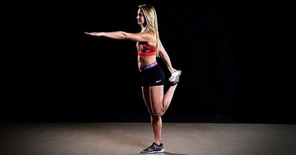 A woman performing a shrimp squat